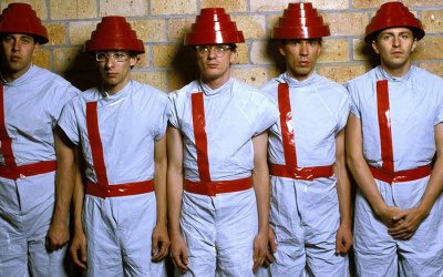 devo remain a singular presence in their npr tiny desk concert